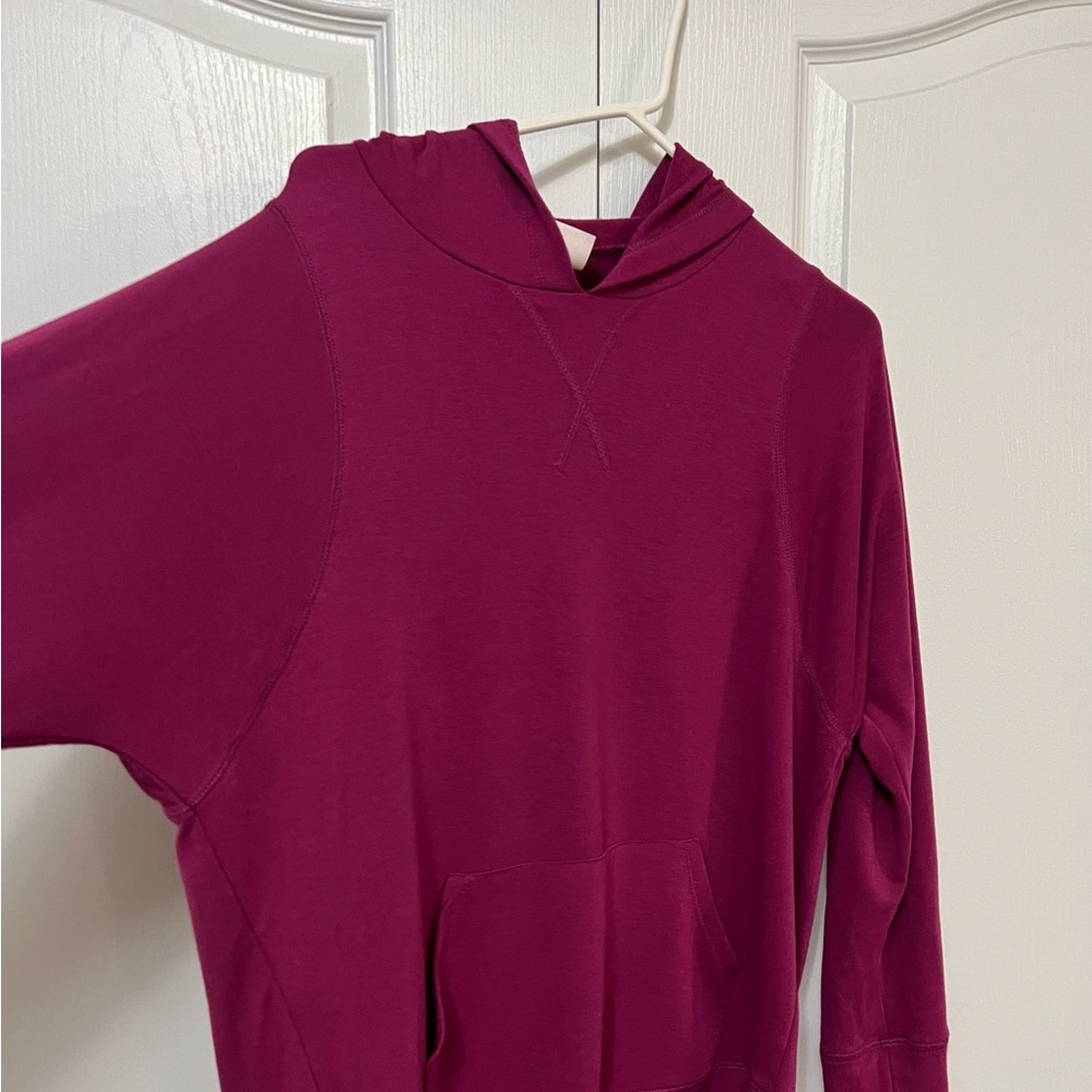 Super soft and lightweight maroon hooded sweatshirt.